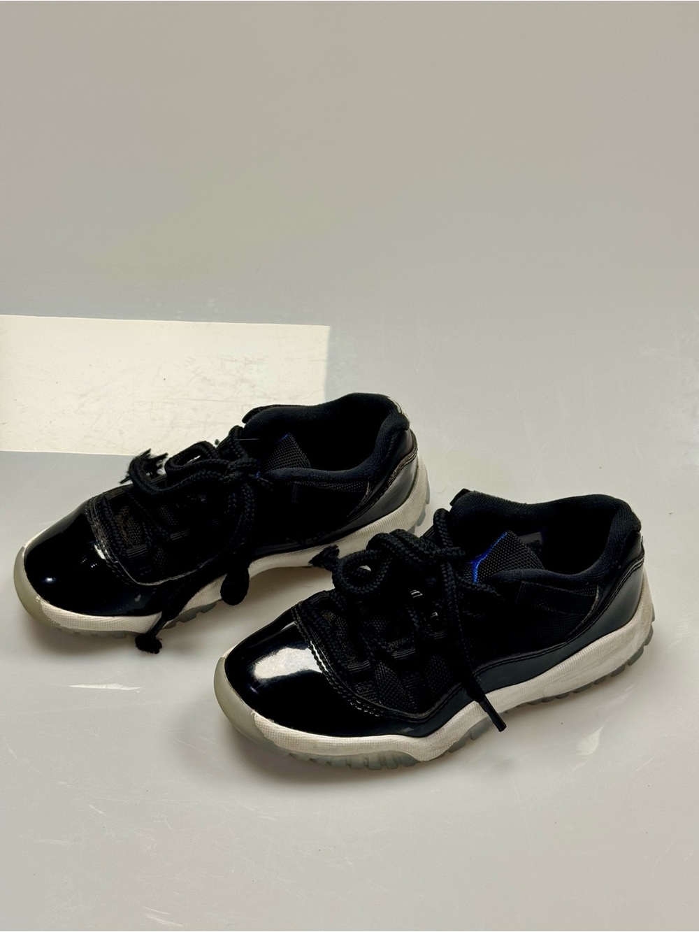 Air Jordan 11 Retro Low Space Jam Black Varsity Royal Kids 12C Sneakers